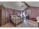 Charming bedroom features vaulted ceilings, accent lighting, and comfortable seating at 1021 Hudson Bay Dr, Greenwood, IN 46142