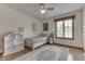 Bright bedroom with a daybed, area rug, and window for natural light at 1021 Hudson Bay Dr, Greenwood, IN 46142
