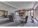 Bright living room with brick fireplace, plush seating, and ample natural light at 1021 Hudson Bay Dr, Greenwood, IN 46142