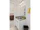 Bathroom features a modern vanity, mirror, and towel rack at 1037 E Woodall Ct, Martinsville, IN 46151