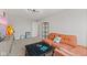 Living room with comfortable seating, a television, and natural lighting at 1037 E Woodall Ct, Martinsville, IN 46151