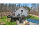 Beautiful backyard featuring a large deck and a swimming pool, perfect for outdoor entertainment at 1037 E Woodall Ct, Martinsville, IN 46151