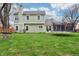 Residential backyard with grassy lawn, and exterior house view at 11117 Harriston Dr, Fishers, IN 46037