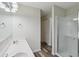 Bathroom featuring a dual vanity with modern fixtures and a glass shower at 11117 Harriston Dr, Fishers, IN 46037
