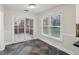Cozy breakfast nook with natural light and access to the screened in porch at 11117 Harriston Dr, Fishers, IN 46037