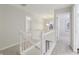 Second story hallway with carpeting and neutral paint at 11117 Harriston Dr, Fishers, IN 46037