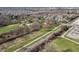 An aerial shot revealing the backyard features and the park and walking path nearby at 11124 Deer Valley Dr, Indianapolis, IN 46229