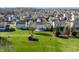 Expansive aerial shot highlighting the home with its well-maintained lawn, deck, and shed at 11124 Deer Valley Dr, Indianapolis, IN 46229