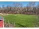 View of the huge yard showing the fence line and well manicured lawn at 11124 Deer Valley Dr, Indianapolis, IN 46229