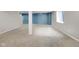 Unfinished basement space featuring plush carpet and a window at 11124 Deer Valley Dr, Indianapolis, IN 46229