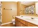 Comfortable bathroom featuring tile floors, a double sink vanity, and a shower with stylish shower curtain at 11124 Deer Valley Dr, Indianapolis, IN 46229