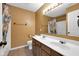 This bathroom features a double sink vanity, a toilet, and a bathtub/shower combo at 11124 Deer Valley Dr, Indianapolis, IN 46229