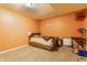 Carpeted basement bedroom featuring painted walls, a bed, and basic furnishings at 11124 Deer Valley Dr, Indianapolis, IN 46229