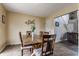 Inviting dining room with stylish wood table, seating for six, and decorative wall accents at 11124 Deer Valley Dr, Indianapolis, IN 46229