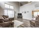 Bright living room with vaulted ceilings, neutral decor, and wood laminate flooring at 11124 Deer Valley Dr, Indianapolis, IN 46229