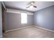 Well-lit bedroom featuring neutral carpet and a closet for easy storage at 1163 Randall Way, Brownsburg, IN 46112