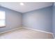 Neutral carpeted bedroom bathed in natural light, creating a serene space at 1163 Randall Way, Brownsburg, IN 46112