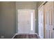 Entryway featuring durable flooring and access to coat closet at 1163 Randall Way, Brownsburg, IN 46112