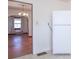 Open kitchen leading to living area with wood floors at 12125 Broadway St, Indianapolis, IN 46236