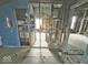 Close view of the house interior, exposing studs and lacking the structure at 1237 N Sheffield Ave, Indianapolis, IN 46222