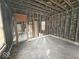 Exposed frame construction visible from inside the home, showing studs and structural elements at 1237 N Sheffield Ave, Indianapolis, IN 46222