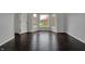 Bedroom featuring hardwood floors and a bay window at 12535 Glendurgan Dr, Carmel, IN 46032