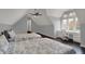 Bedroom with two beds, desk area, view from the window and hardwood floors at 12535 Glendurgan Dr, Carmel, IN 46032