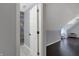 Hallway with view of bathroom and bedroom with hardwood floors at 12535 Glendurgan Dr, Carmel, IN 46032