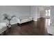 Inviting living room with hardwood floors, neutral paint, and an open layout at 12535 Glendurgan Dr, Carmel, IN 46032