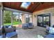 Comfortable sunroom with skylight and brick accent wall, perfect for relaxation at 12535 Glendurgan Dr, Carmel, IN 46032