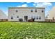 Large backyard with a patio, grill, and lush green lawn at 1279 Windswept Dr, Greenwood, IN 46143