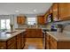 Bright kitchen with a center island, stainless steel appliances, and ample counter space at 1279 Windswept Dr, Greenwood, IN 46143