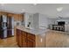 Inviting kitchen with a center island, stainless steel appliances, and open to the dining area at 1279 Windswept Dr, Greenwood, IN 46143