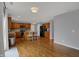 Updated kitchen with stainless steel appliances, a center island, and hardwood flooring at 1279 Windswept Dr, Greenwood, IN 46143
