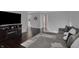 Inviting living room with hardwood floors, comfortable sectional sofa and fireplace at 1279 Windswept Dr, Greenwood, IN 46143