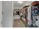 Spacious walk-in closet with ample storage and custom shelving at 1279 Windswept Dr, Greenwood, IN 46143
