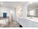 Spa-like bathroom with double vanity, soaking tub, and tiled shower at 12988 Fernie Cir, Fishers, IN 46037