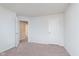 Bright bedroom with neutral walls, carpeted floor, and paneled doors at 12988 Fernie Cir, Fishers, IN 46037