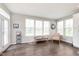 Bright and airy living room filled with natural light from multiple windows at 12988 Fernie Cir, Fishers, IN 46037