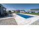Backyard pool with gazebo and view of surrounding homes in the community at 12988 Fernie Cir, Fishers, IN 46037