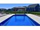 Inviting backyard pool with a gazebo, perfect for relaxation and entertaining guests at 12988 Fernie Cir, Fishers, IN 46037