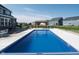 Backyard pool with gazebo, patio area and black aluminum fence at 12988 Fernie Cir, Fishers, IN 46037