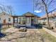 Compact backyard and patio with a small building offers great space for outdoor living at 1351 S Belmont Ave, Indianapolis, IN 46221