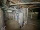 Basement with brick walls and pipes at 1351 S Belmont Ave, Indianapolis, IN 46221