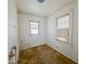 Quaint room with dual windows, offering lots of natural light, with old carpet ready to be upgraded at 1351 S Belmont Ave, Indianapolis, IN 46221