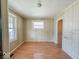 Cozy bedroom with natural light from two windows at 1351 S Belmont Ave, Indianapolis, IN 46221