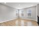 Spacious bedroom featuring wood floors, neutral walls and an abundance of natural light at 13833 Tender Dr, Carmel, IN 46032