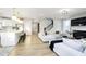 Bright, open concept living room, kitchen, and staircase with lots of natural light at 14477 Stairbridge Pl, Carmel, IN 46032