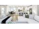 Open concept living space with a kitchen, eating area, and Gathering room at 14477 Stairbridge Pl, Carmel, IN 46032