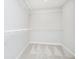 A walk-in closet with carpeted floor and white wire shelving at 14477 Stairbridge Pl, Carmel, IN 46032